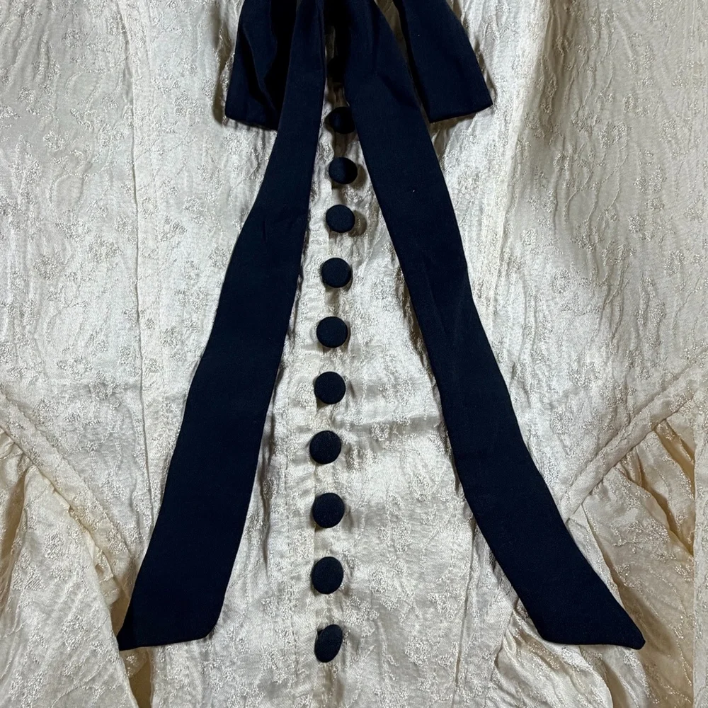Free People NWT Ivory Textured Puff Sleeve Peplum Top Black Tie Bow Size P